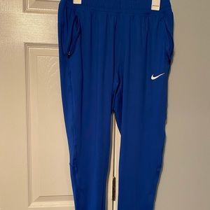 NWT Nike Women’s running tapered pants, Medium